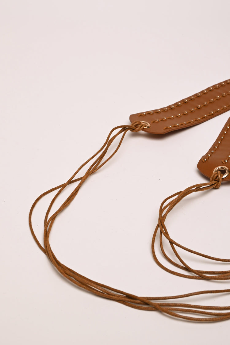 Strings and mini stud sash belt