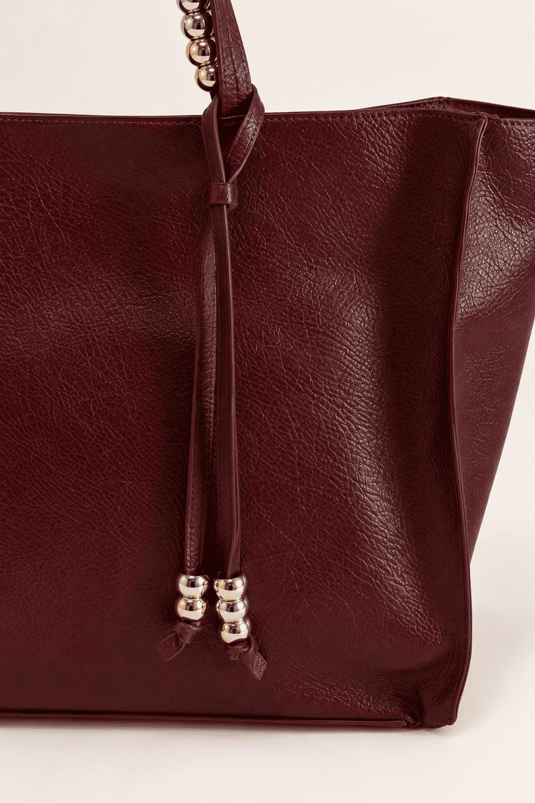 Burgundy faux leather shoulder bag