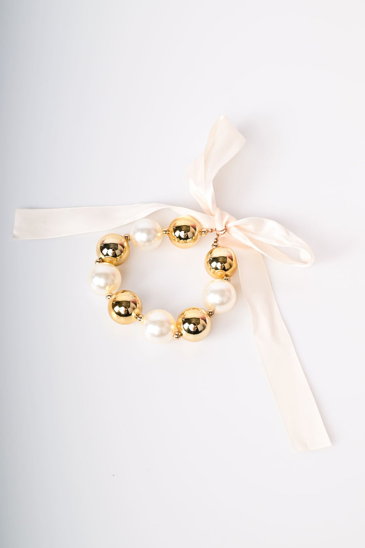 Pearls and self-tie strap chocker