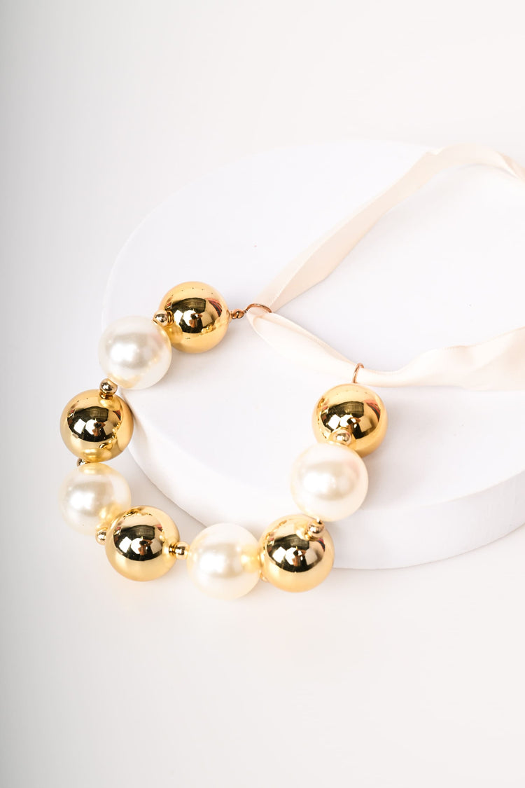 Pearls and self-tie strap chocker