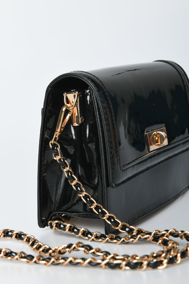 Faux patent leather crossbody bag