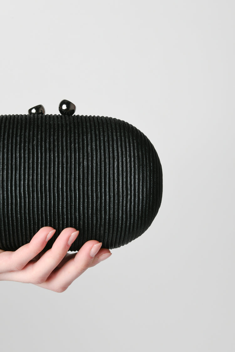 Oval clutch bag