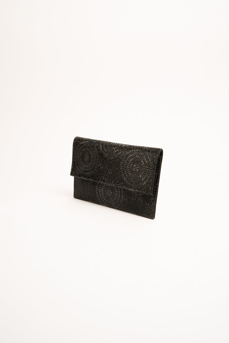 Black circle motif rhinestone clutch bag