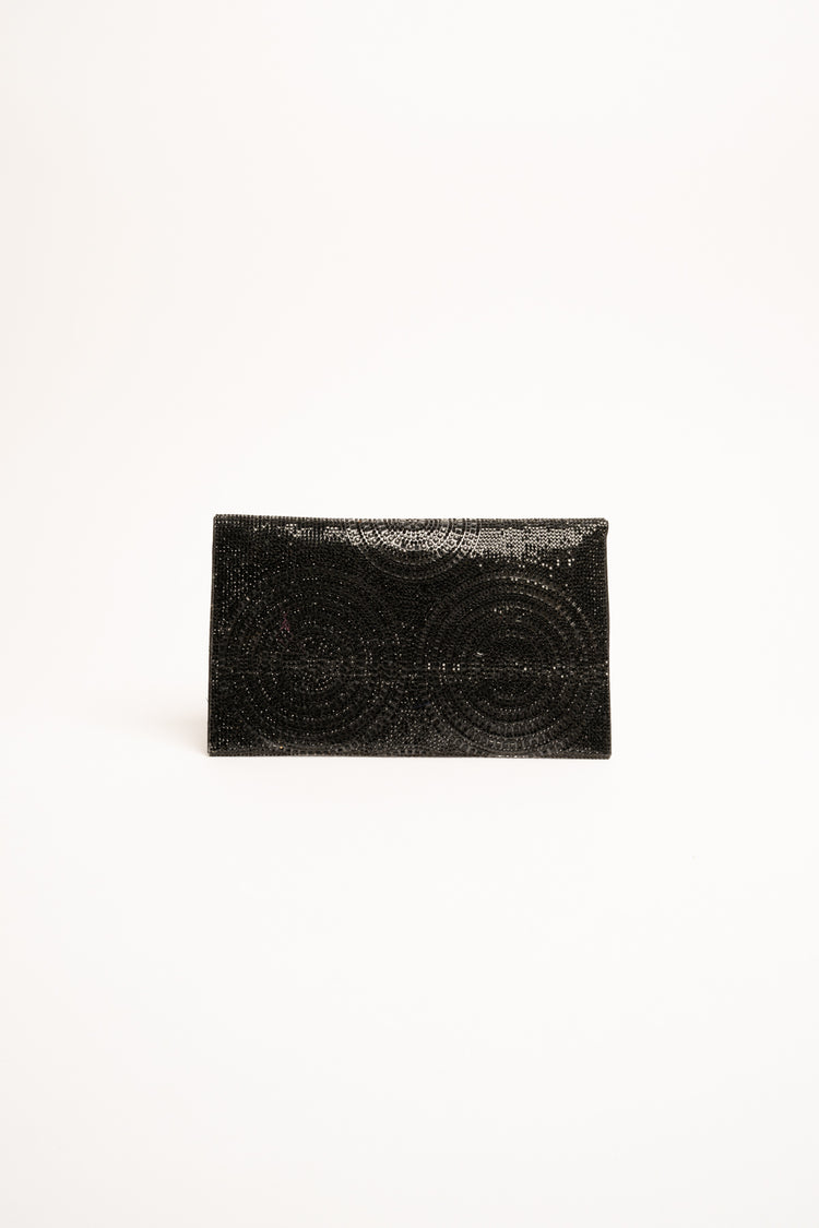 Black circle motif rhinestone clutch bag