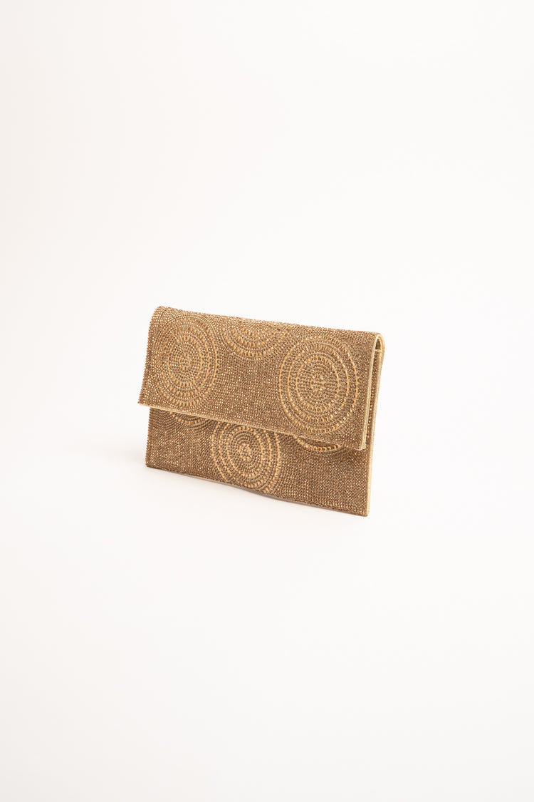 Golden circle motif rhinestone clutch bag