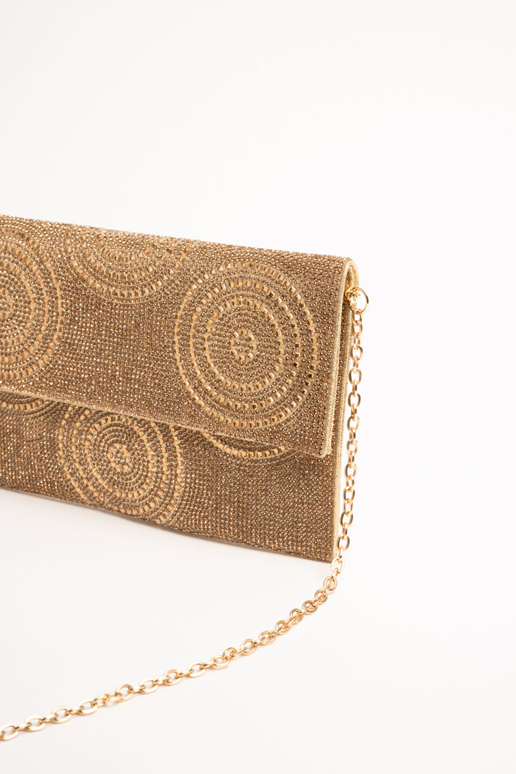 Golden circle motif rhinestone clutch bag