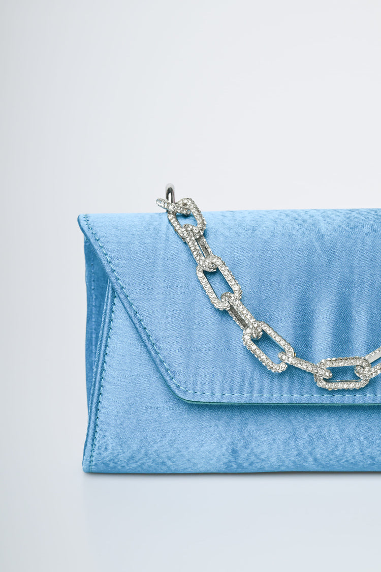 Jewel handle satin clutch bag