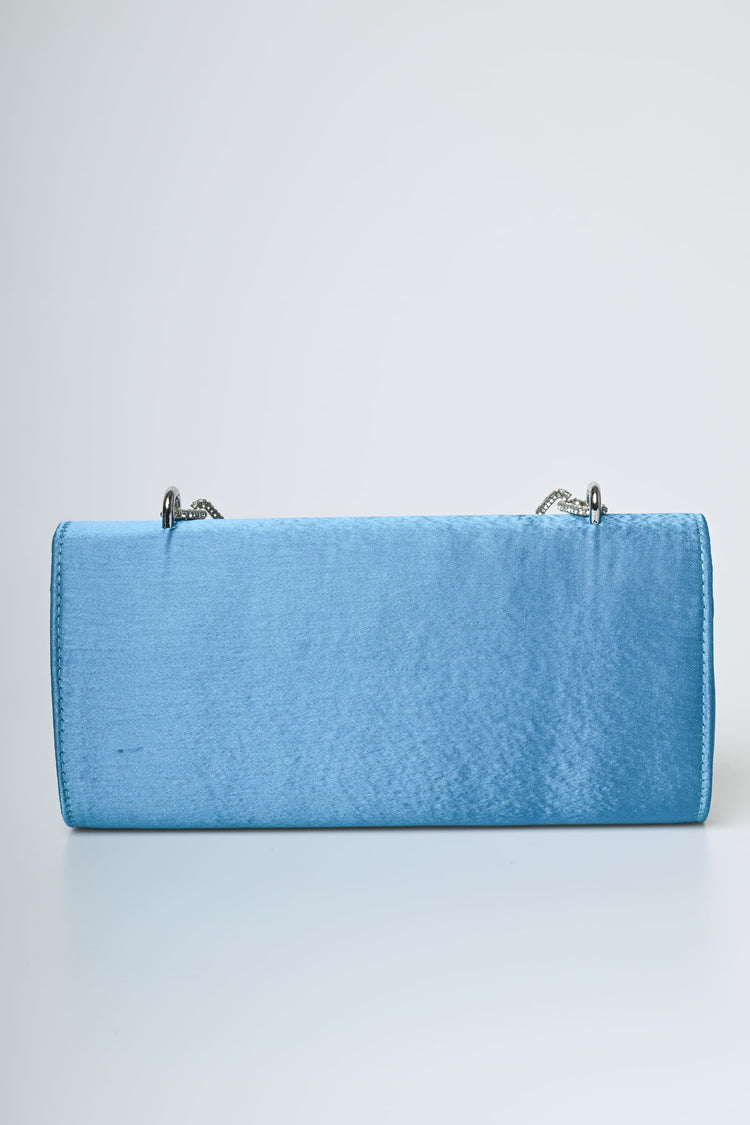 Jewel handle satin clutch bag