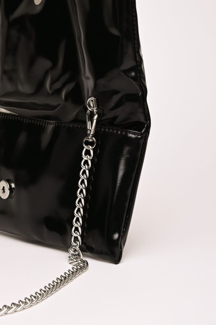 Stud embellished black faux leather foldable clutch bag