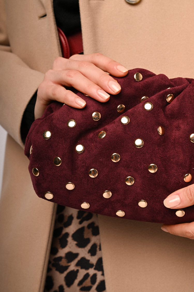 Stud-embellished clutch bag