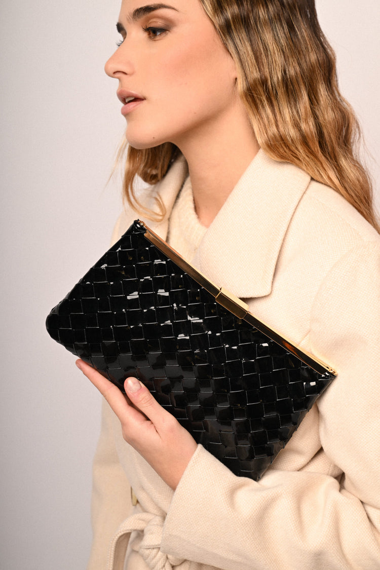 Woven faux patent leather clutch bag