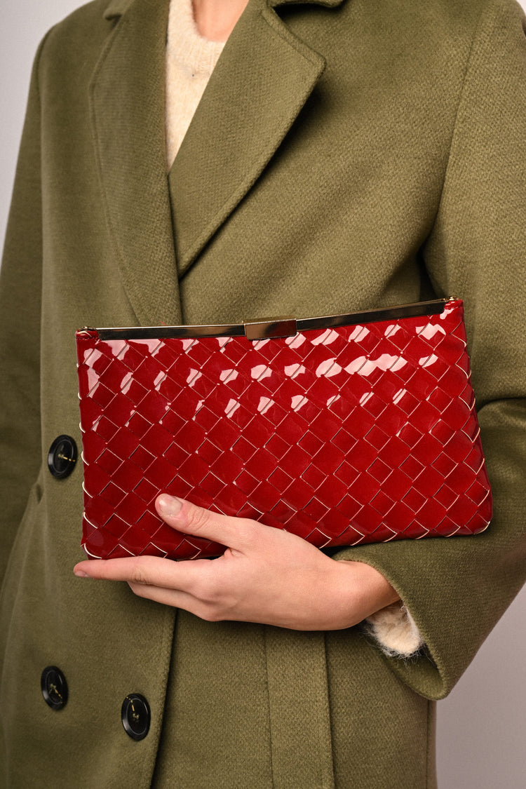 Woven faux patent leather clutch bag