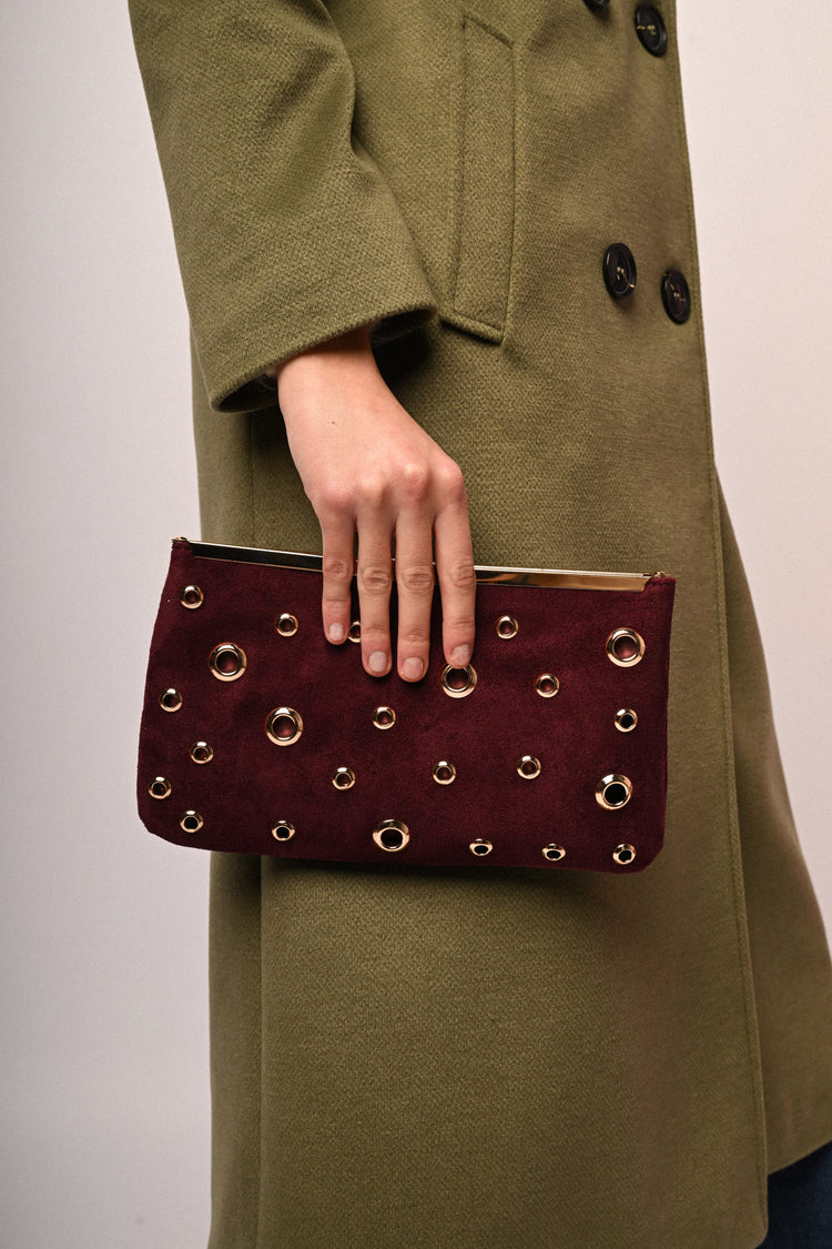 Stud-embellished clutch bag