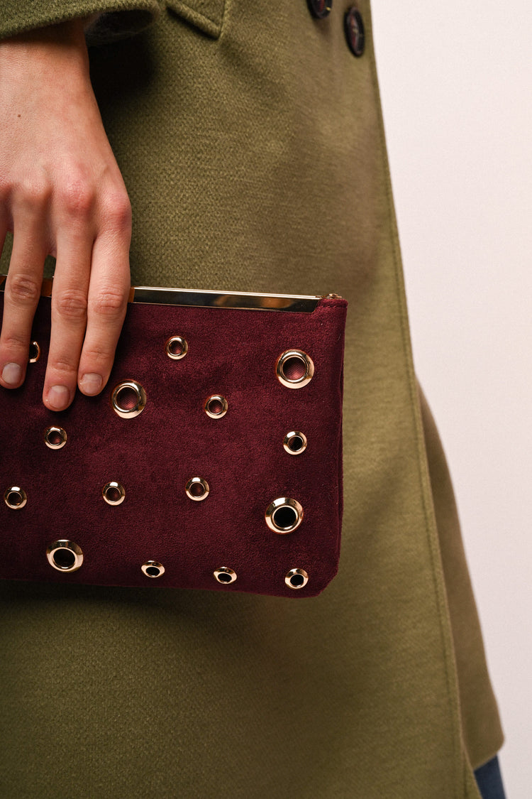 Stud-embellished clutch bag