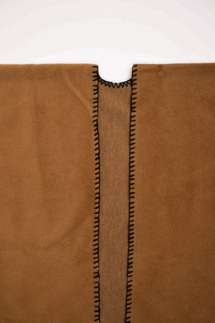 Poncho con impuntura