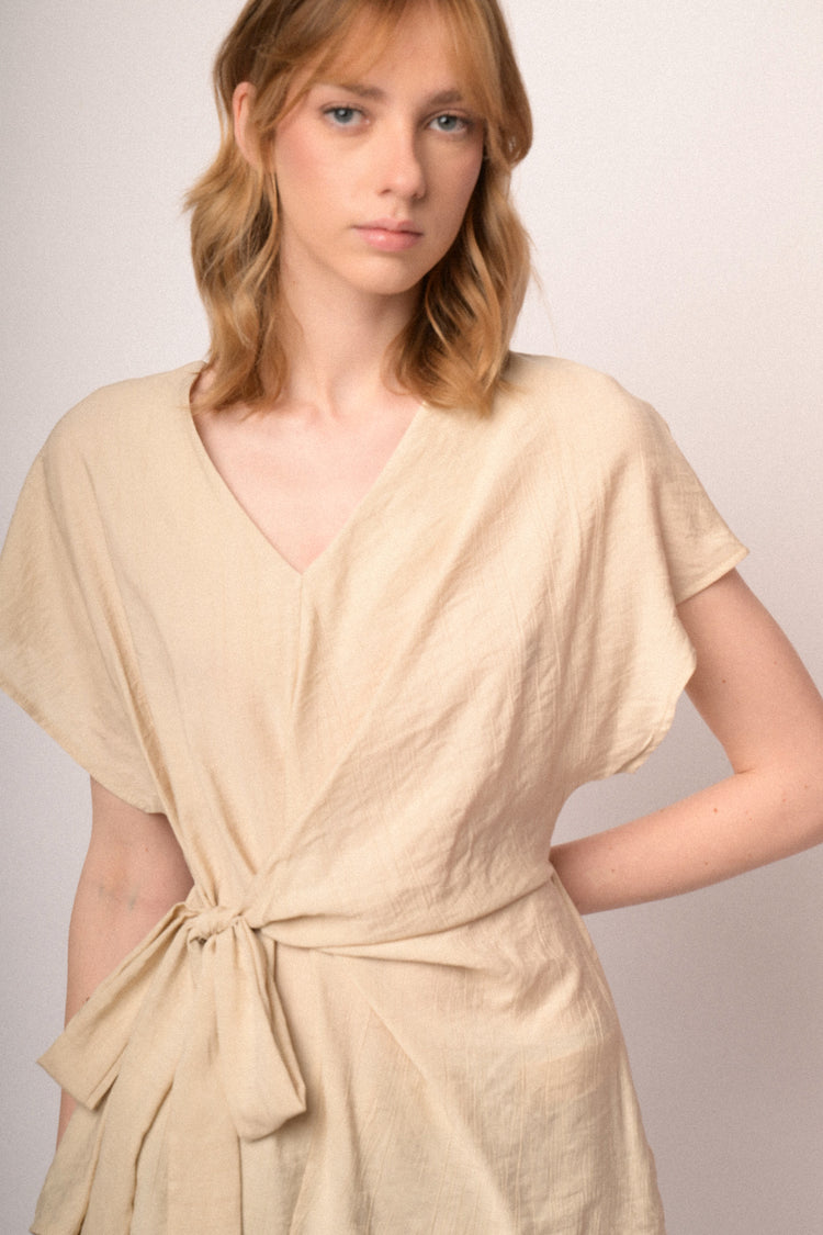 Beige V-neck and self-tie knot top