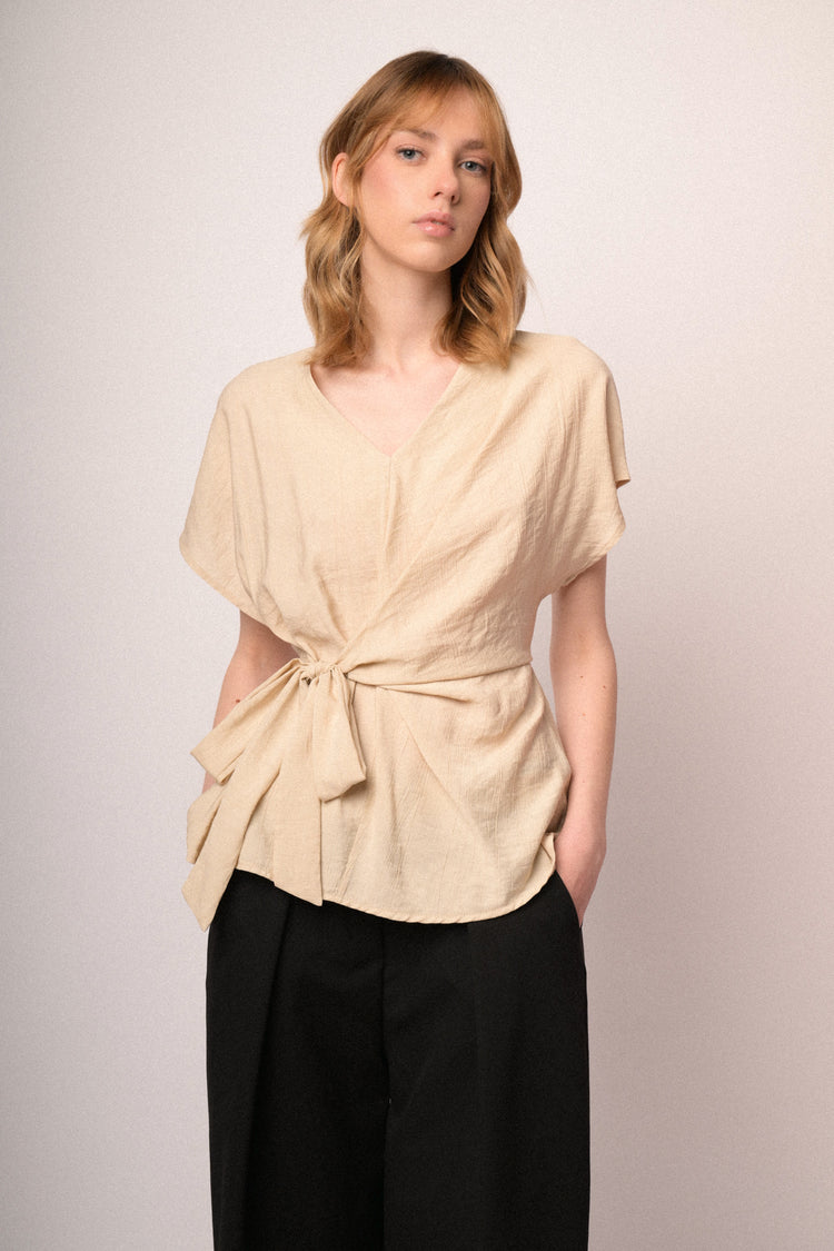 Beige V-neck and self-tie knot top