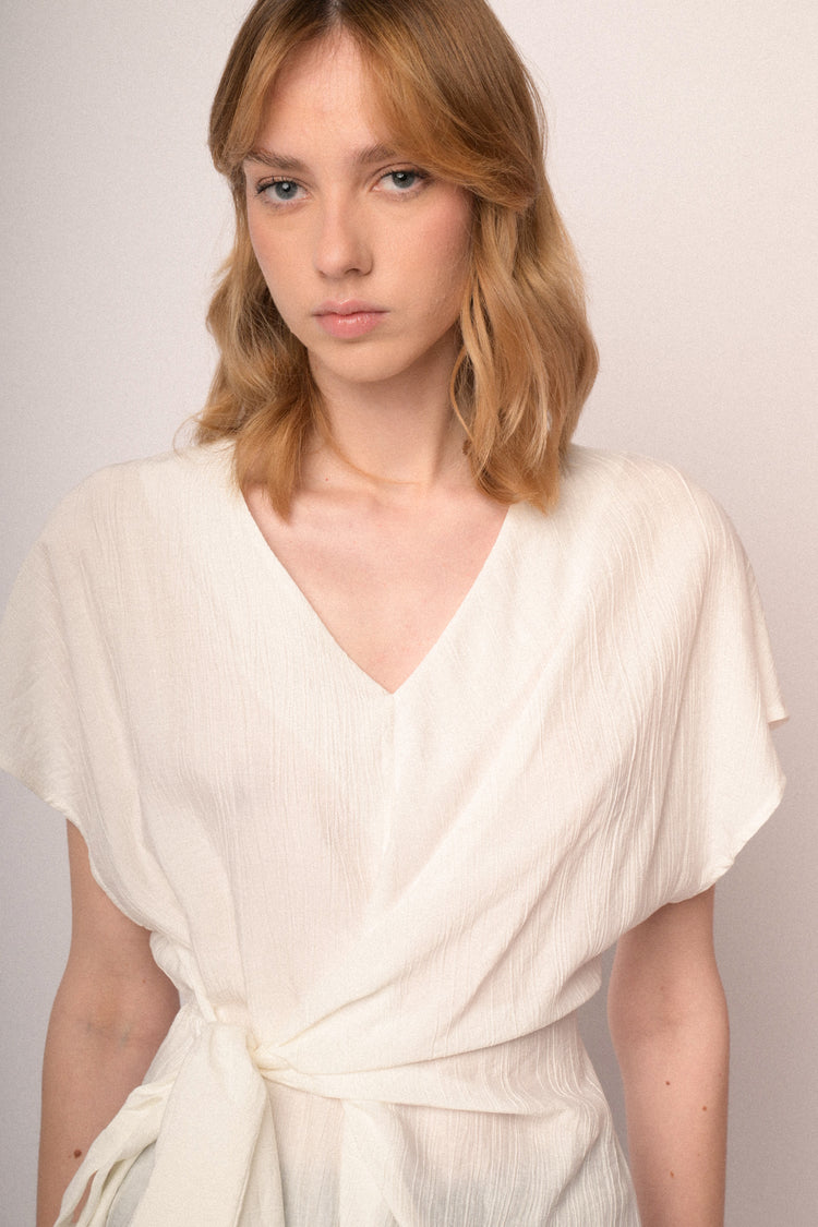 Beige V-neck and self-tie knot top