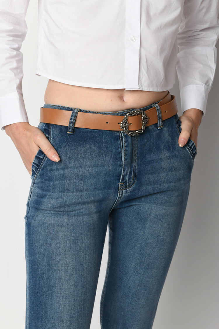 Belted skinny jeans